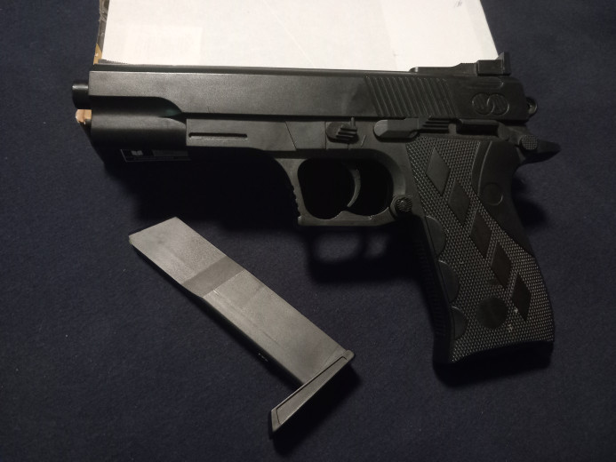 Spring powered pistol