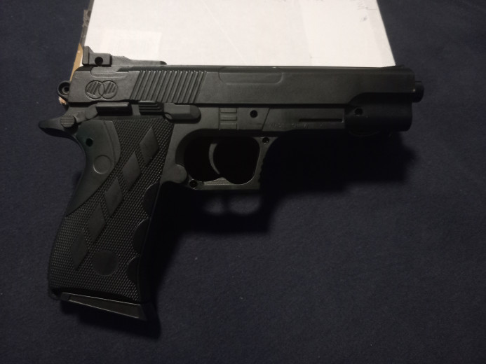 Spring powered pistol