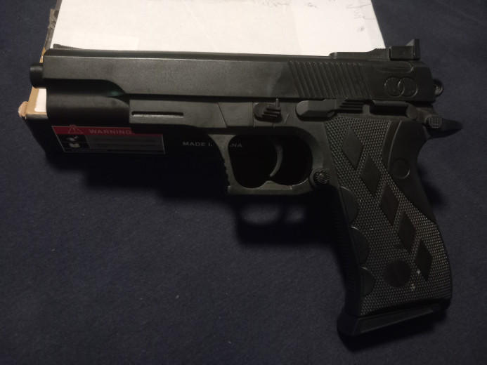 Spring powered pistol