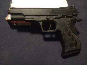 Spring powered pistol